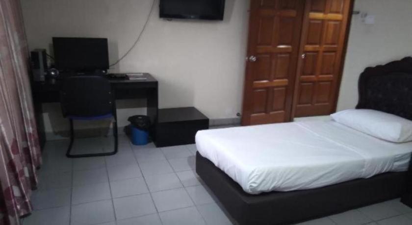Oyo 90376 Centre Point Hotel Limbang Eksteriør billede